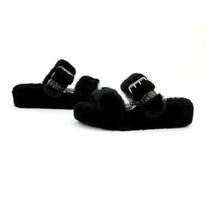 Black UGG slipper style shoe